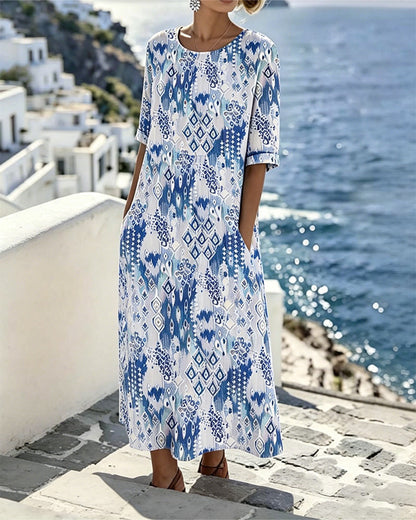 Emma | Loose and lightweight floral midi dress